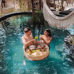 https://the-yellow-nest-tulum.tulum-hotels.net